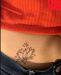 lotus stomach tattoos for women
